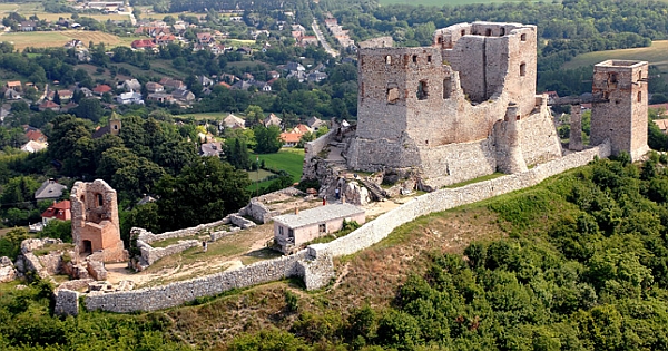 Eagle-eye view of a castle on a green hill