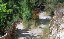 Narrow sandy hiking track along a hillside