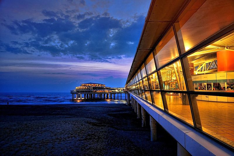 the Pier at Scheveningen beach at the start of the walking holiday Pier at Scheveningen in evening light