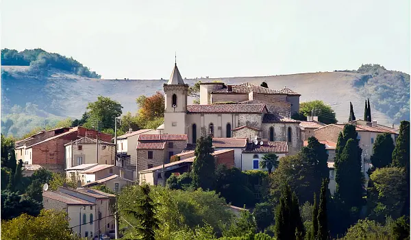 French hilltop village with church in the center
