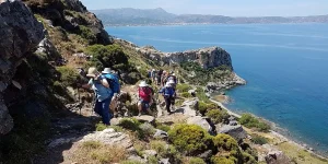 People on a walking holiday in Crete, climbing a mountain